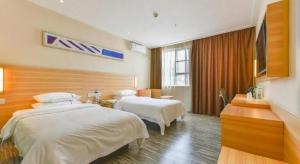 Postel nebo postele na pokoji v ubytování City Comfort Inn Nanning Langdong Changhu + 189 fotografií