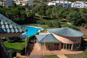 an overhead view of a house with a swimming pool at A & G Sabinillas in San Luis de Sabinillas