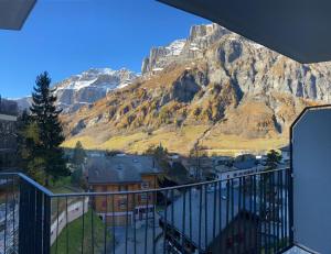 a balcony with a view of a mountain at Haus Flaminia 15 - Best view studio / Free parking in Leukerbad