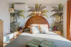 Ένα ή περισσότερα κρεβάτια σε δωμάτιο στο Les Fenières