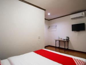 TV a/nebo společenská místnost v ubytování OYO 836 PK Residence + 74 fotografií