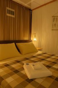 Postel nebo postele na pokoji v ubytování Pepper Hills Hostel & Cottages + 65 fotografií