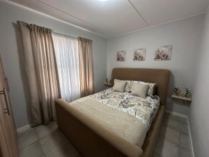 Ένα ή περισσότερα κρεβάτια σε δωμάτιο στο Urban Hideaway +6 φωτογραφίες