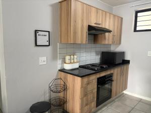 Η κουζίνα ή μικρή κουζίνα στο Urban Hideaway