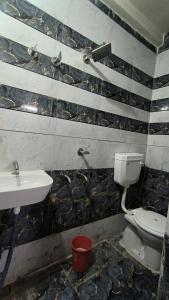 Koupelna v ubytování Shlok homestay