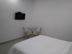 Hotel Boutique Santorini Class的电视和/或娱乐中心