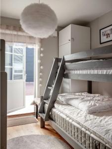 En eller flere senge i et værelse på Boende i Lindvallen, Sälen