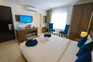 TV a/nebo společenská místnost v ubytování Corner View Hotel