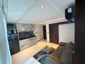 Köök või kööginurk majutusasutuses SERENITY Wongamant CONDO