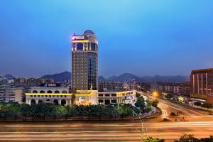 a tall building with a light on top of it at Guilin China Southern Pearl Hotel in Guilin