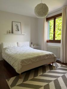 a bedroom with a large bed in a room at Apartment near Treviso in Silea in Silea