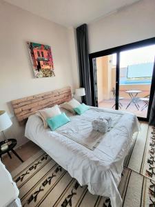 Postel nebo postele na pokoji v ubytování Casa Rosa Hacienda Del Alamo