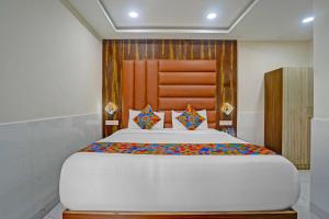 Ένα ή περισσότερα κρεβάτια σε δωμάτιο στο FabHotel Small Daddy Plus - 200m From Calangute Beach +23 φωτογραφίες