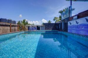Πισίνα στο ή κοντά στο FabHotel Small Daddy Plus - 200m From Calangute Beach