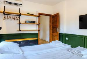 Postel nebo postele na pokoji v ubytování Paganini House close to Center and Rowing Canal