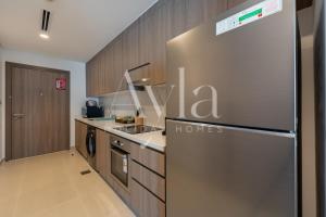 Kuchyň nebo kuchyňský kout v ubytování The Yas Luxe Escape Studio On Yas Island By Ayla