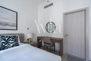 Postel nebo postele na pokoji v ubytování The Yas Luxe Escape Studio On Yas Island By Ayla