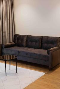 Posezení v ubytování ММ GROUP APARTMENT