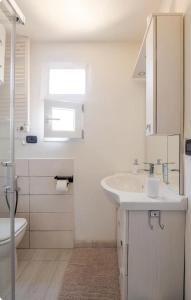 Koupelna v ubytování Como lake stay& service