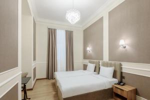 Ένα ή περισσότερα κρεβάτια σε δωμάτιο στο Novo Sky Boutique +21 φωτογραφίες