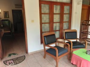 TV a/nebo společenská místnost v ubytování Pahalage Guesthouse