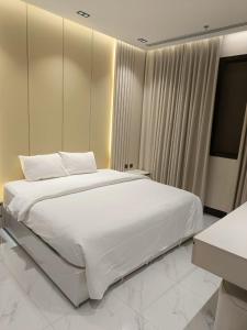 Voodi või voodid majutusasutuse أركان ونس للشقق المخدومة toas