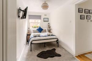 Postel nebo postele na pokoji v ubytování Cozy Cottage next to Newhaven Harbour