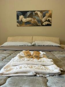 Ένα ή περισσότερα κρεβάτια σε δωμάτιο στο Viale Apartment