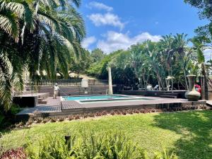 Bazén v ubytování House 37 Nkululeko in Sodwana Bay Lodge nebo v jeho okolí