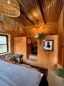 Ένα ή περισσότερα κρεβάτια σε δωμάτιο στο One Eye Dog