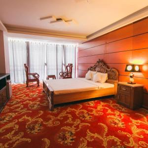 Ένα ή περισσότερα κρεβάτια σε δωμάτιο στο Khu Nghỉ Dưỡng Đoàn 298 Khu 7 Tầng