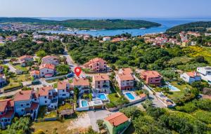 an aerial view of a town with houses at House Ivica in Banjole