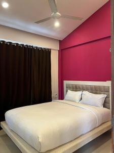 Ένα ή περισσότερα κρεβάτια σε δωμάτιο στο Vista Vagator Junction by Dia Hotels and Homes