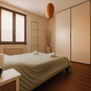 Ένα ή περισσότερα κρεβάτια σε δωμάτιο στο Civico 44 - Con Aria condizionata e Wi-Fi vicino a Ospedale e Centro Iperbarico