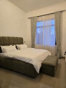 Ένα ή περισσότερα κρεβάτια σε δωμάτιο στο Matanak 2