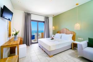 Μια τηλεόραση ή/και κέντρο ψυχαγωγίας στο Blue view seaside hotel