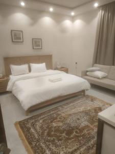 Ένα ή περισσότερα κρεβάτια σε δωμάτιο στο دادن 1 - Dadan 1