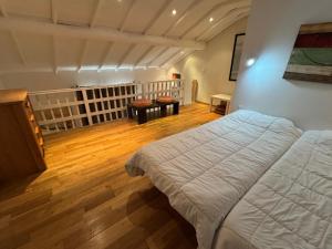 Ένα ή περισσότερα κρεβάτια σε δωμάτιο στο Immodelpas Velasquez