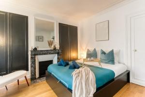 Postel nebo postele na pokoji v ubytování Charmant T2 aux portes de Paris 2 min de la gare