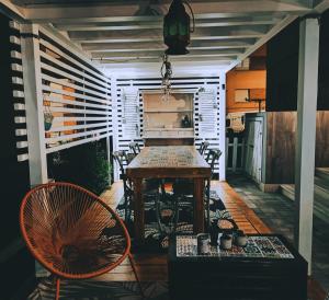 a room with a table and chairs on a porch at AlCivico3 in Civitanova Marche