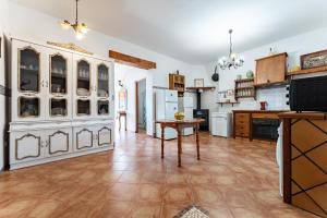 Kuchyň nebo kuchyňský kout v ubytování MalagaSuite Cortijo Segura