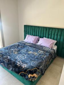 Giường trong phòng chung tại Les belles loges