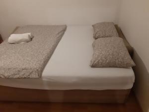 Postel nebo postele na pokoji v ubytování CenterZeroZoneOne + 9 fotografií