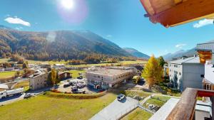 an aerial view of a town with a mountain at Abitaziun Allegra Sur DG - Zuoz in Zuoz