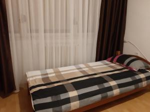 Postel nebo postele na pokoji v ubytování CenterZeroZoneOne