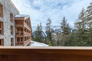 a view from the balcony of a building at Antarès URSA 303 - luxury apartment ski inski out in Méribel