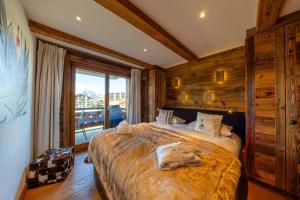 Ένα ή περισσότερα κρεβάτια σε δωμάτιο στο Glacier 5 - Hammam - Spa Access