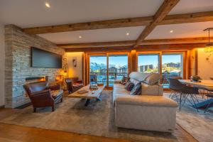 Μια τηλεόραση ή/και κέντρο ψυχαγωγίας στο Glacier 5 - Hammam - Spa Access