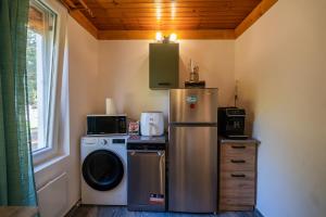 Η κουζίνα ή μικρή κουζίνα στο Non stop apartman 2