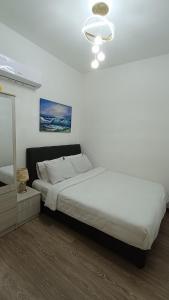 Voodi või voodid majutusasutuse Self Check-in Condo-2BR at Kajang toas